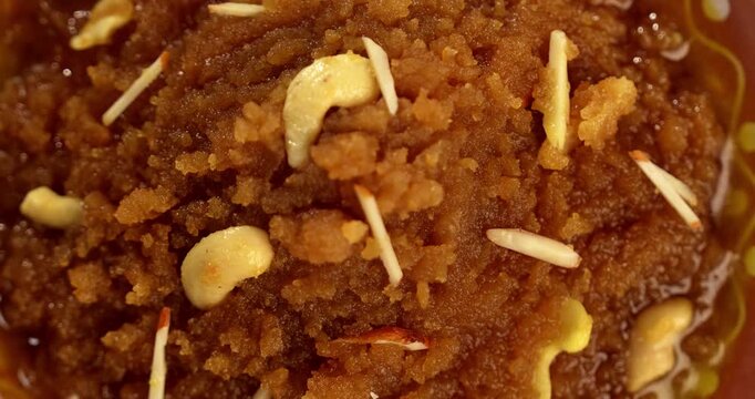 Moong dal halwa is a classic Indian sweet dish made with moong lentils, sugar, ghee and cardamom powder