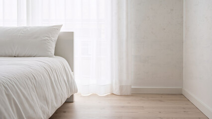 Minimalist bedroom interior with white bed and sheer curtain. Clean and simple design for comfort and restful sleep concept. Hotel room.