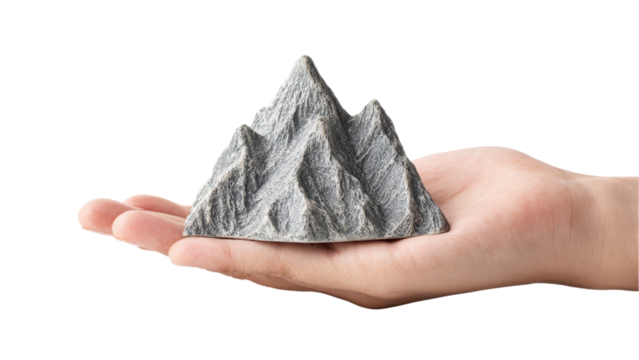 Hand Holding Miniature Mountain on White