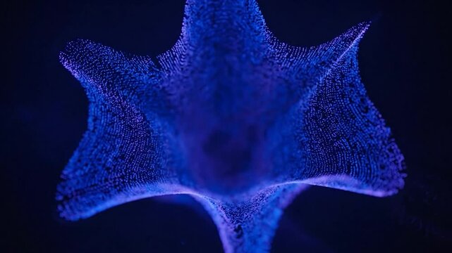 Blue light point cloud forms abstract, concave shape on dark background