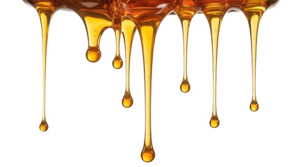 Thick golden honey dripping in viscous strands and droplets isolated on a transparent background