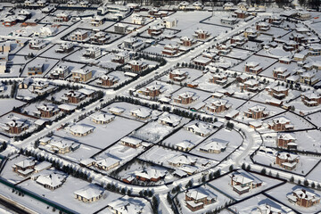 Aerial view of suburban neighborhood with many houses