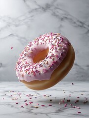 Sweet Whirl: A delectable donut with a luscious pink glaze and colorful sprinkles is captured mid-air, casting a gentle shadow. It's a tempting treat that promises pure indulgence.