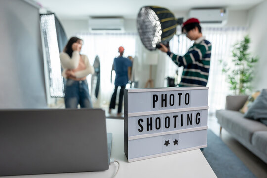 Close up sign of photo shooting showing behind the scenes of film crew. 