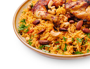 Delicious chicken and rice dish with nuts and herbs served in a bowl