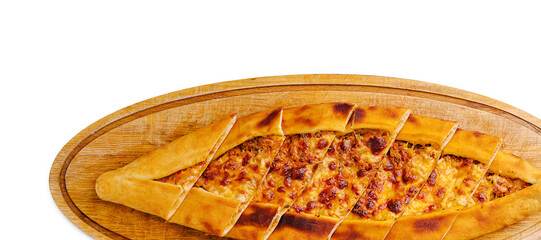 Delicious Turkish pide served on a wooden platter with melted cheese