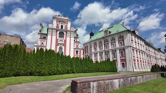 Walking towards Parish Church of St. Stanislaus (Fara Church) in poznan, Poland