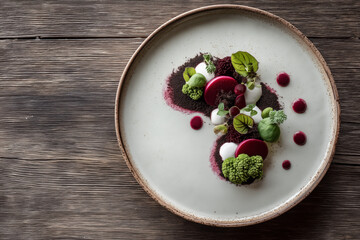 Elegant vegetable dish presentation with beets, cream, and herbs on rustic wood table, perfect for healthy eating promotion and fine dining concepts