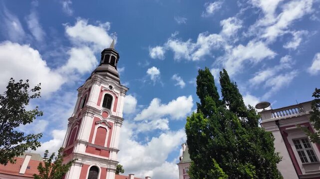 Walking towards Parish Church of St. Stanislaus (Fara Church) in poznan, Poland
