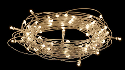 A tangled coil of warm white glowing fairy lights on a thin wire, creating a magical festive ambiance against a dark background