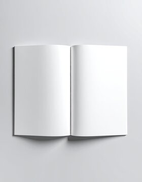 Blank open magazine or book mockup template viewed from above on a light gray surface.