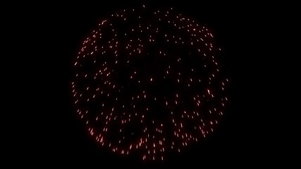 Perfect red spherical firework bursts against black background. Ideal for New Year or 4th of July celebration overlays. Isolated element