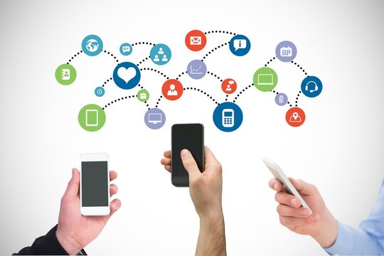 Hands holding smartphones connected to a network of colorful social media and app icons representing digital communication and connectivity
