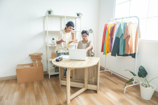Young Entrepreneurs Enthusiastically Manage Fashion Business Orders and Online Sales