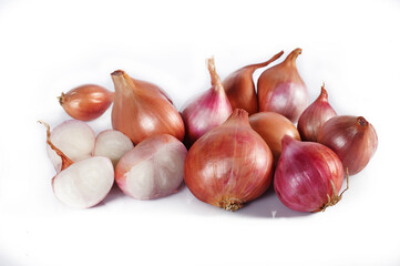 pile of shallots on white background