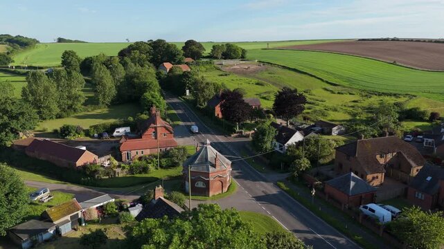 Quaint rural village is a small, picturesque settlement with traditional charm, characterized by historic houses and buildings and a peaceful atmosphere, beautiful natural landscapes, rolling hills
