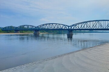Truss-type bridge across a wide river