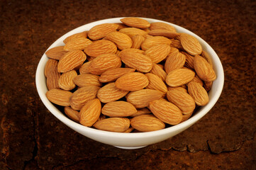 almonds nuts in white bowl