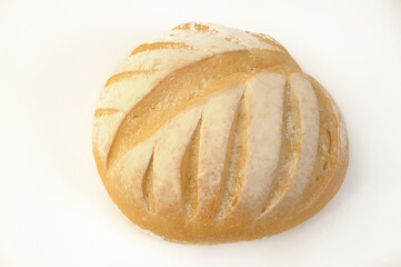 Freshly baked round bread isolated on white background