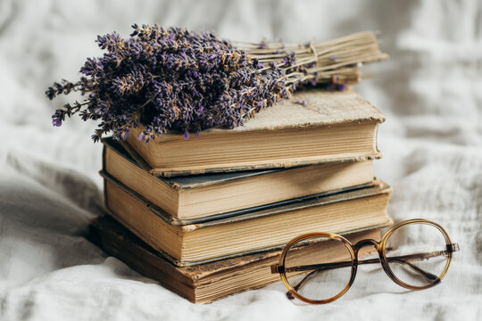 Vintage charm with lavender and antique books, perfect for creating a cozy and intellectual atmosphere, ideal for book lovers and aesthetic designs