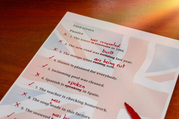 English test with red correction words