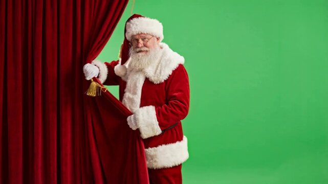 Santa character peeking from behind red velvet curtain on green screen studio background, playful holiday reveal concept for Christmas marketing, greeting cards and festive promotions