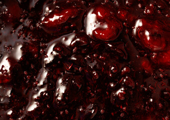 Obraz premium Raspberry jam as an abstract background. Close-up