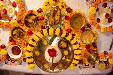 Traditional Bengali Aiburobhaat Ritual Food Arrangement with Floral Decoration