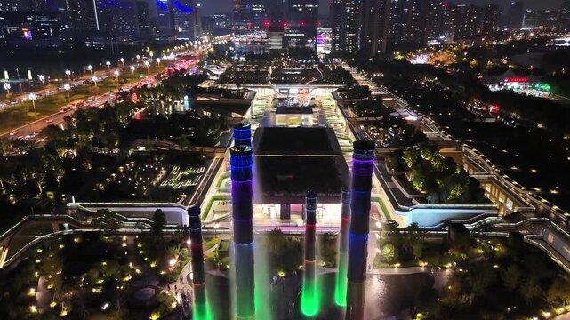 Chengdu Night Aerial: Illuminated Tower Complex with Vibrant City Lights