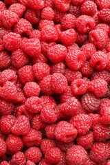 Fresh ripe raspberries as background, top view