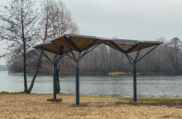 A park with a lake and a pavilion