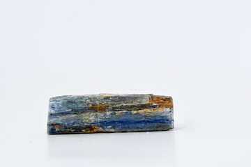 A raw, blue Kyanite mineral specimen with a bladed crystalline structure. Kyanite is an aluminum silicate often found in metamorphic rock, prized for its blue color.