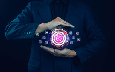 Business goal setting concept. Businessman holding virtual target icon for business purpose. Strategic planning for business growth. Marketing strategy and goal for success.
