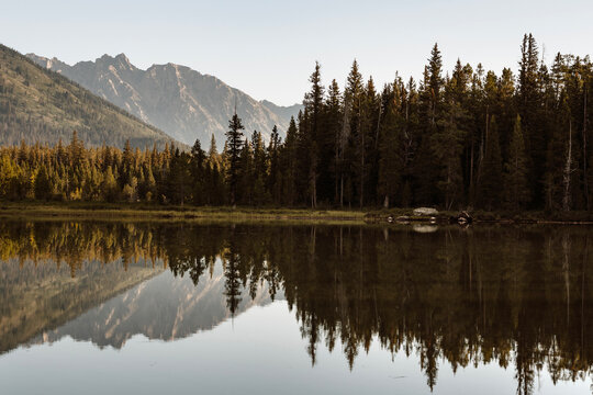 Tetons reflected in still waters of String Lake, Wyoming