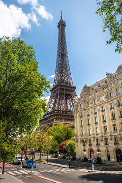 Paris France Eiffel Tower seen through historic city buildings