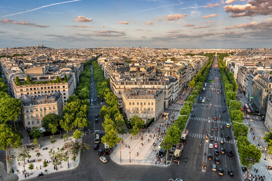 Paris France aerial view of cars on tree lined city boulevards