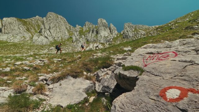 Hikers enjoy rugged trails at Prutas Loop in Durmitor, Montenegro
