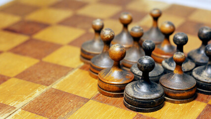 Old retro wooden chess set, intellectual strategy game.