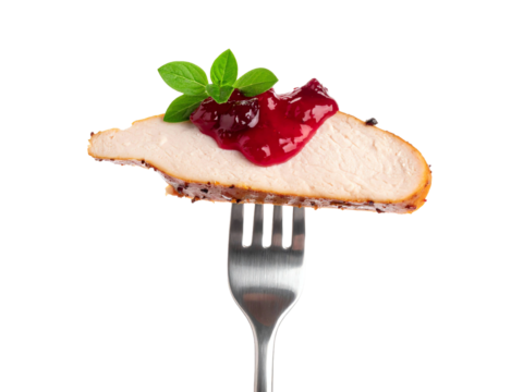 Juicy turkey fork berry sauce highlights delicious roasted poultry with vibrant red cranberry topping, minimal white background, and appetizing clean food presentation.