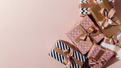 festive background lots of gift boxes with bows birthday gifts, valentine's day, anniversary gift, new year and christmas gift boxes.