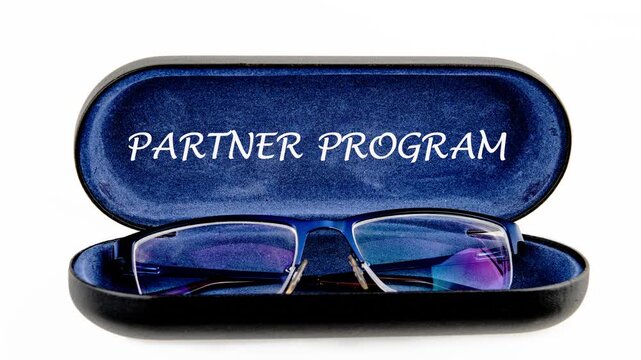 Conceptual partner program symbol. Animation of the conceptual text of the PARTNER PROGRAM on the inside of the eyeglass case