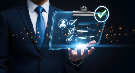 Elevate business success using digital checklist held by confident business person in dark professional setting