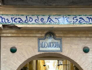 Ancient Alcaiceria Market archway with historic ceramic tiles in Granada, Andalusia, Spain,...