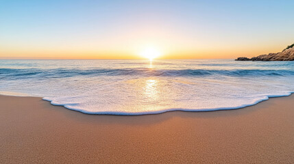 Gentle sunrise over calm ocean with soft foam on sandy beach, peaceful warm light