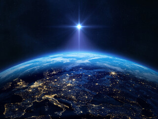 Nightly Earth planet. Star of Jesus or Christmas Star. Planet Earth in outer space. Star of...