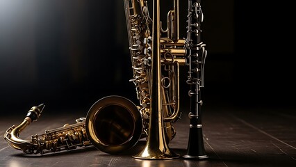 Classic brass and woodwind instruments, featuring a saxophone, trumpet, and clarinet, elegantly poised on a dark stage, ready for a captivating musical performance
