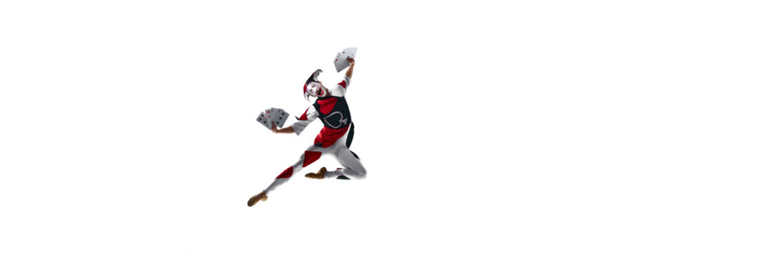 Wide-frame jester leap holding large playing cards in dramatic arc. Concept of gaming promo visuals, motion-heavy character scenes, stage performance materials with expressive movement. Banner