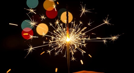 Sparkling celebration a festive sparkler against a dark background with bokeh