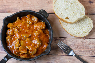 Hungarian chicken gizzard stew in pan