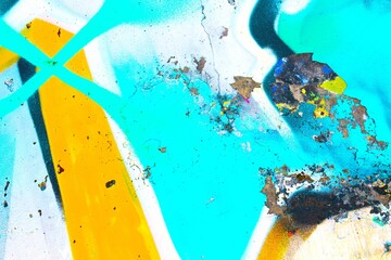 Fototapeta premium Abstract graffiti art in blue, yellow, white with urban 90s style, bold strokes, distressed texture. Street art, urban decor, digital backgrounds, modern 90s, Y2K creative banner.